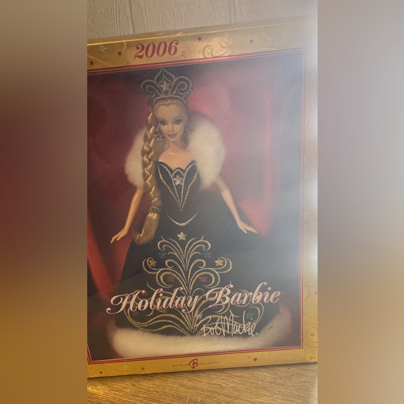 2006 original holiday Barbie. the box has never been opened. (need gone asap)